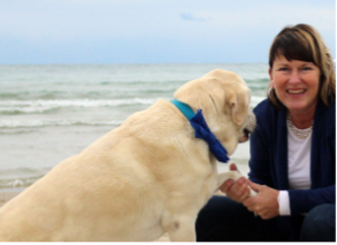 Allison Groff with a Golden Retriever